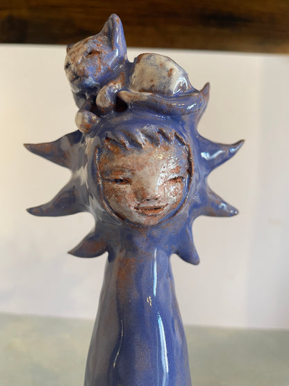 Enfant-soleil et son chat en céramique