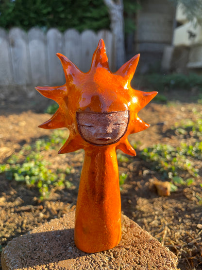 Soleil intérieur orangé en céramique