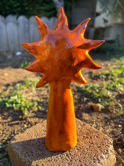 Soleil intérieur orangé en céramique